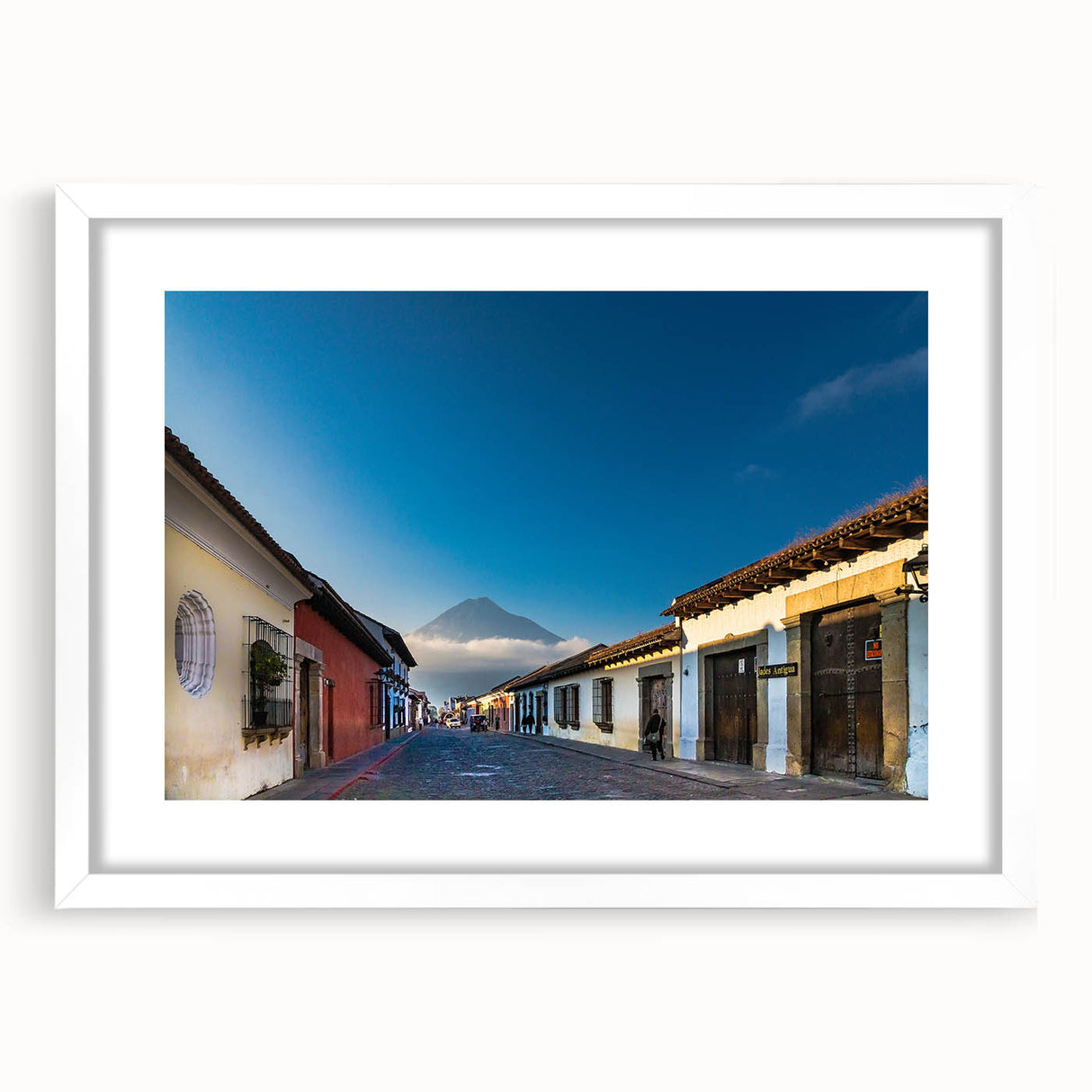 Abstract art print of a Central American landscape in muted earth tones on a framed white mat.