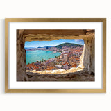 Extra large wall art depicting an abstract European scenery in textured hues of blue and gold, framed in gold.
