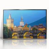 Mid-century modernist art depicting Prague skyline in muted tones on silver-framed acrylic.