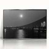 Large art print of the Thames River, featuring muted blue and gray tones on a framed acrylic.