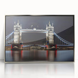 Acrylic print of Tower Bridge in muted blue and gray, framed in silver, ideal for modern art wall decor.