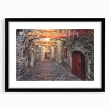 Extra large abstract art print of colorful, textured European scenery on a black framed canvas, ideal for living room decor.