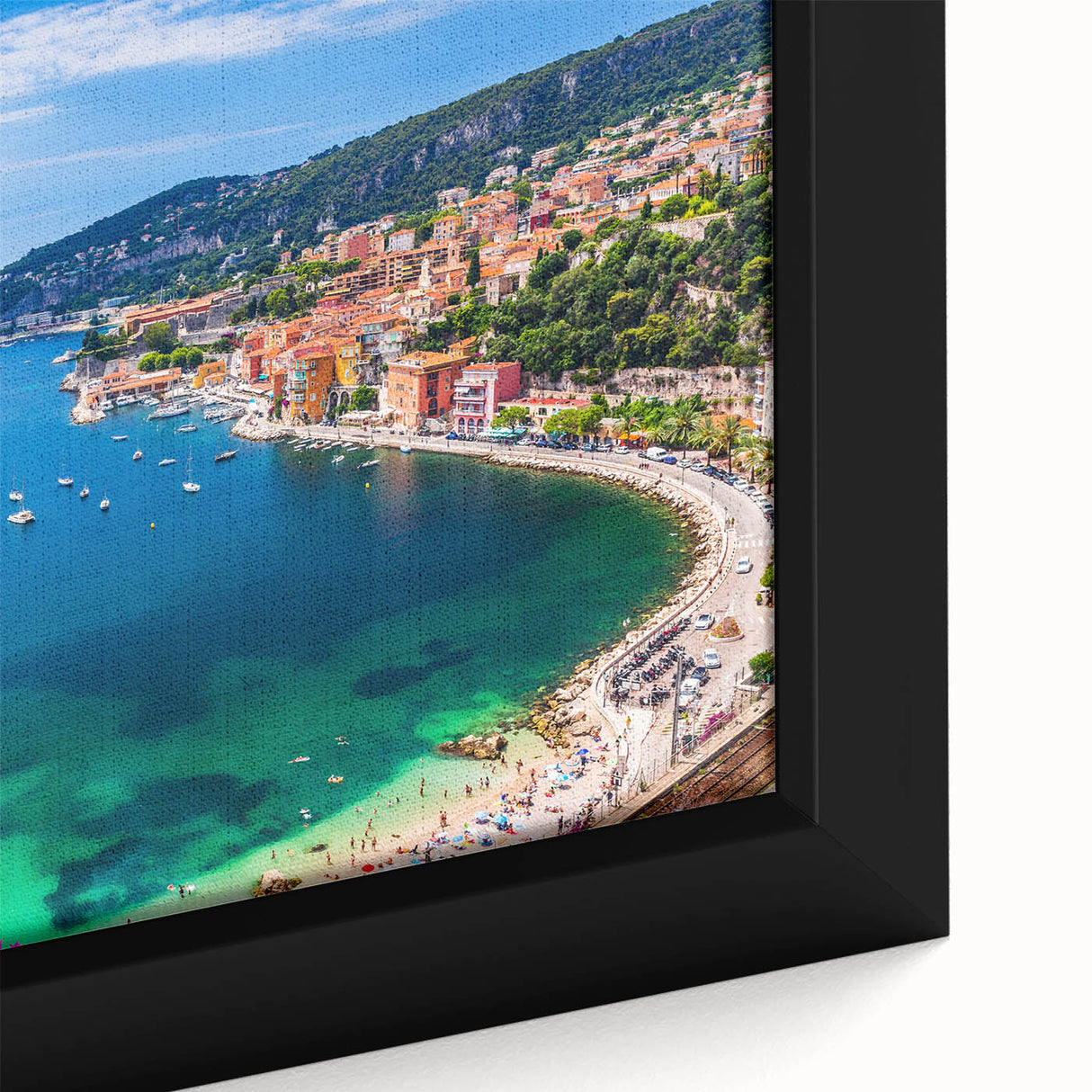 Black wall art featuring a textured, colorful depiction of Nice, France on a large framed canvas.