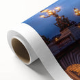 Art Deco poster of Paris scenery on rolled canvas, featuring muted pastel shades.