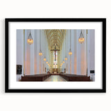 Abstract art print of a colorful Munich skyline in textured style on a large black-framed canvas.