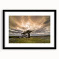 Abstract art print of a colorful, textured Irish landscape in a black frame, ideal for living room decor.