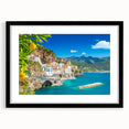 Colorful abstract art print of the Amalfi Coast in vibrant hues on a large framed canvas, ideal for living room decor.