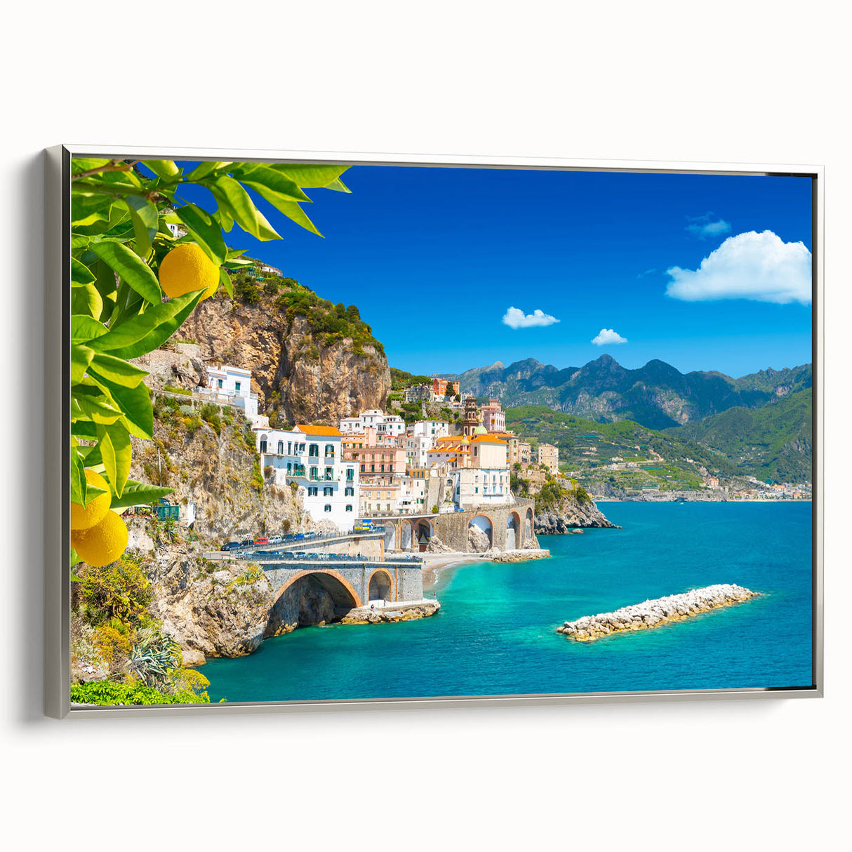 Framed canvas of a vintage-style landscape painting depicting the Amalfi Coast in vibrant, colorful hues.