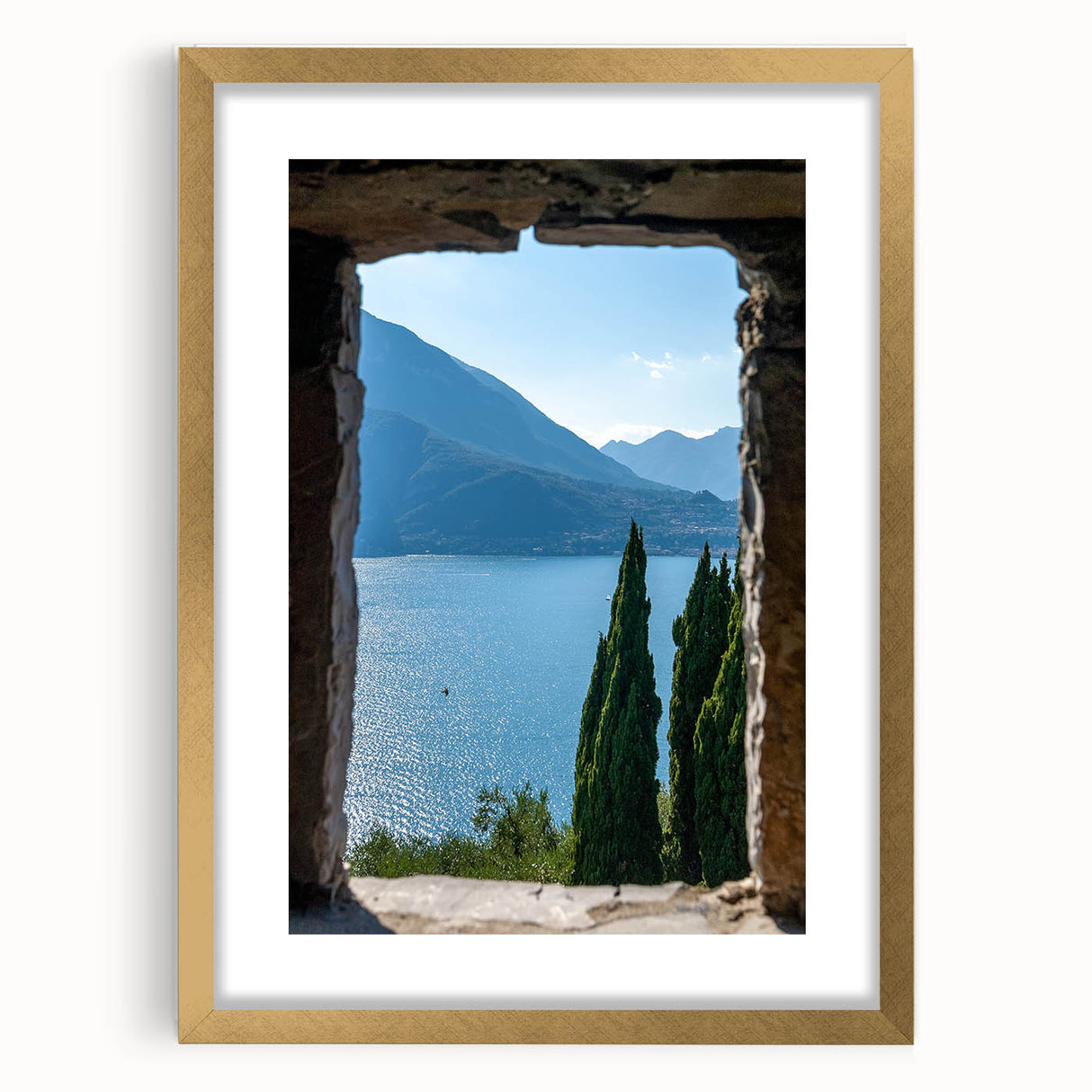 Abstract art print of Lake Como with muted blue and green hues, framed in gold, suitable for dining room decor.