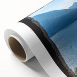 Art deco poster of Lake Como with muted blue and green tones on rolled canvas, ideal for nursery wall art.