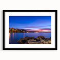 Colorful abstract art print of Portofino, Italy in vibrant hues on a large black-framed canvas, ideal for living room decor.