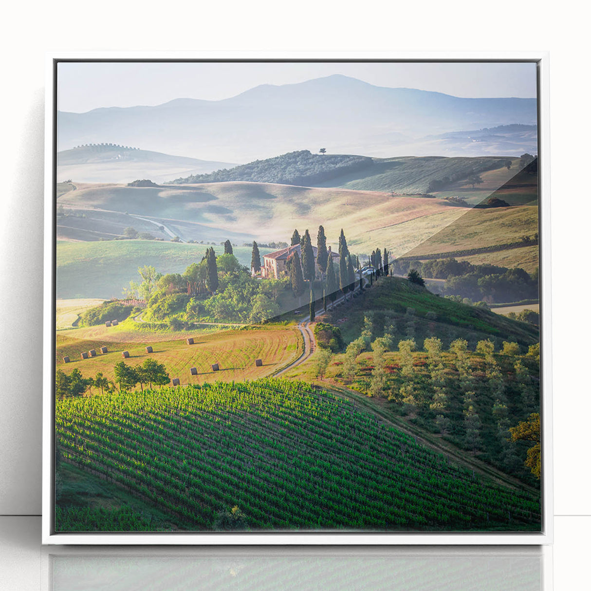 Mid-century modernist art depicting the Tuscany landscape on a framed acrylic, in soft earth tones.