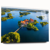 Large abstract wall art of a European scenery in muted blue and green tones on acrylic glass.