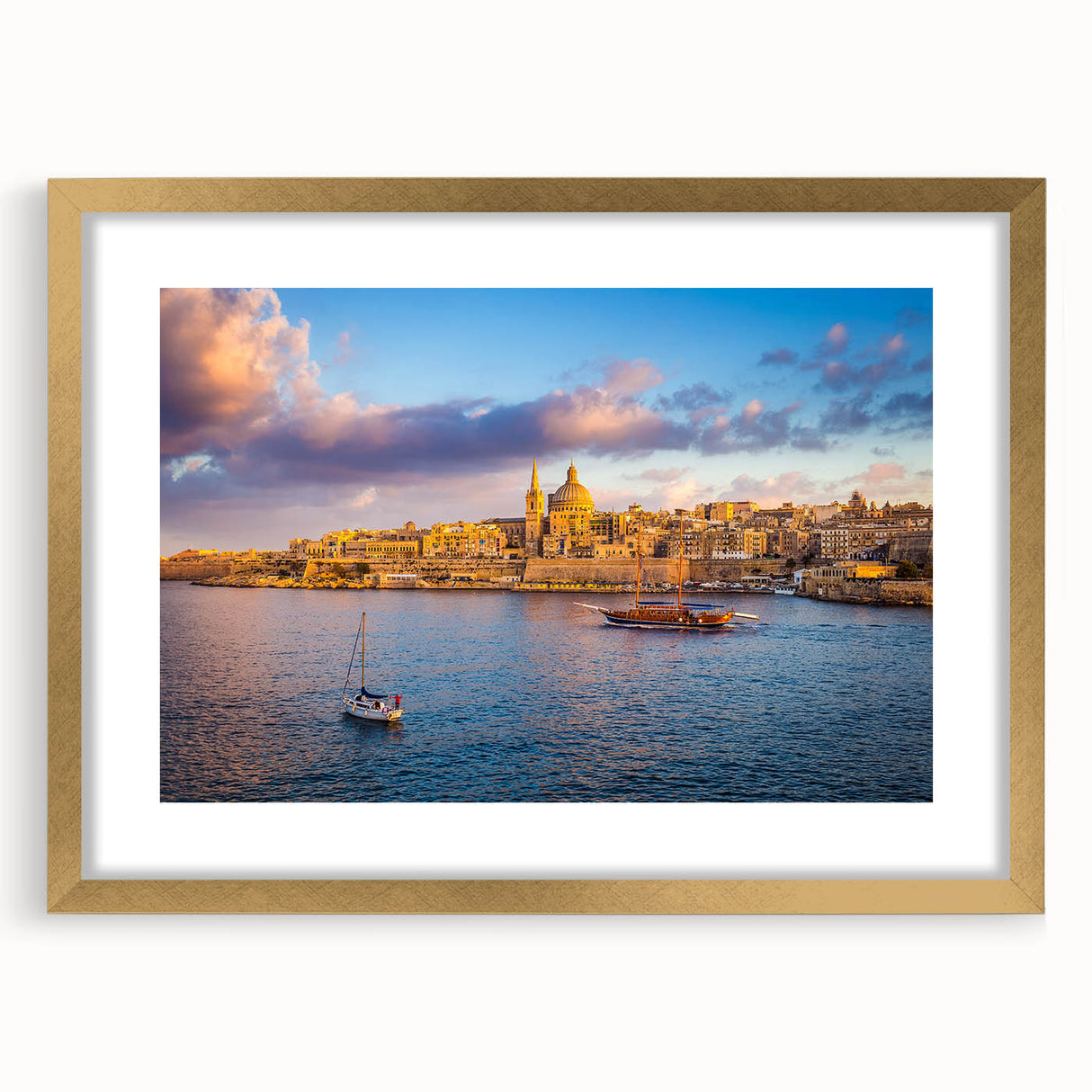 Abstract art print of a European Malta scenery in muted earth tones on a gold-framed canvas, suitable for dining room decor.
