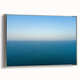 Framed canvas landscape art painting of the Mediterranean Sea with vibrant blue waters and colorful coastal buildings.