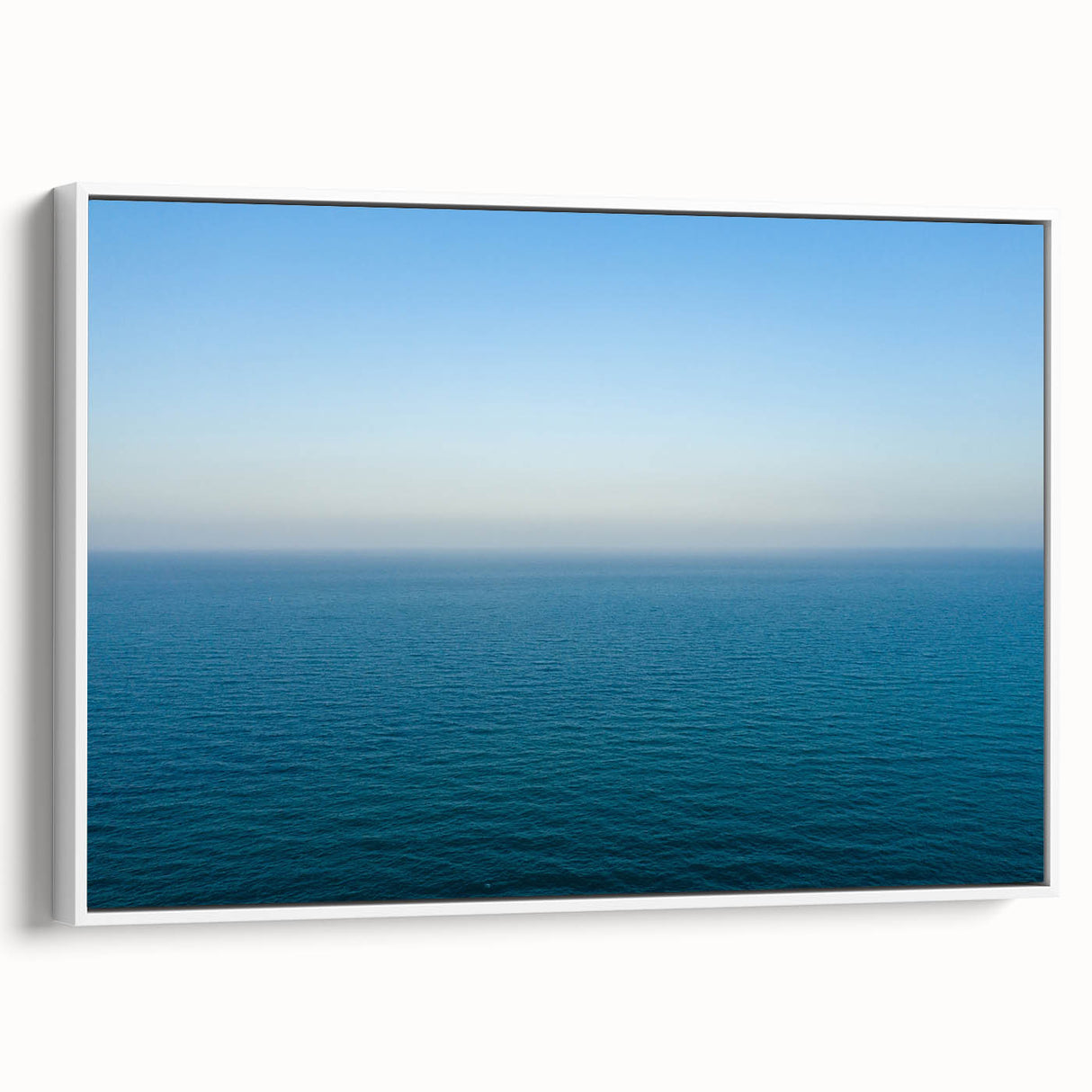 Vintage poster art of the Mediterranean Sea on framed canvas, featuring a colorful palette, ideal for living room decor.