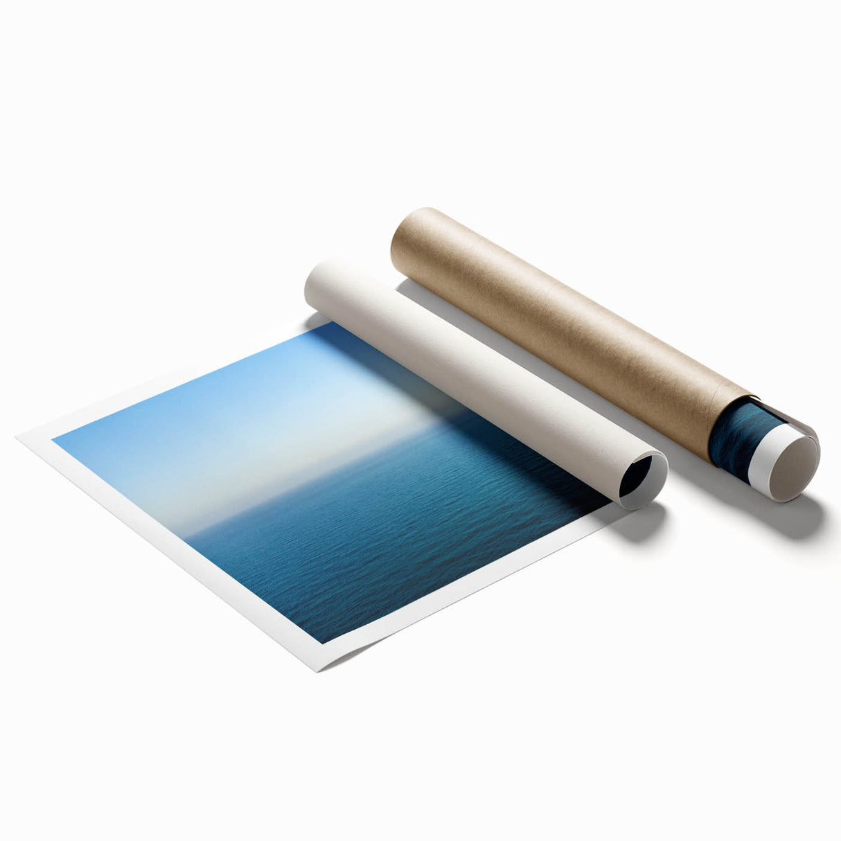 Extra large rolled print of a Mediterranean seaside with floral accents in soft blue and white tones.