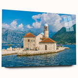 Large abstract wall art of a European scenery in Montenegro, depicted in vibrant greens and blues on acrylic glass.