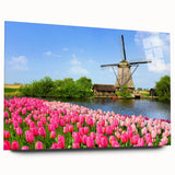 Large abstract wall art of a European scenery in muted blue and green tones on acrylic glass.