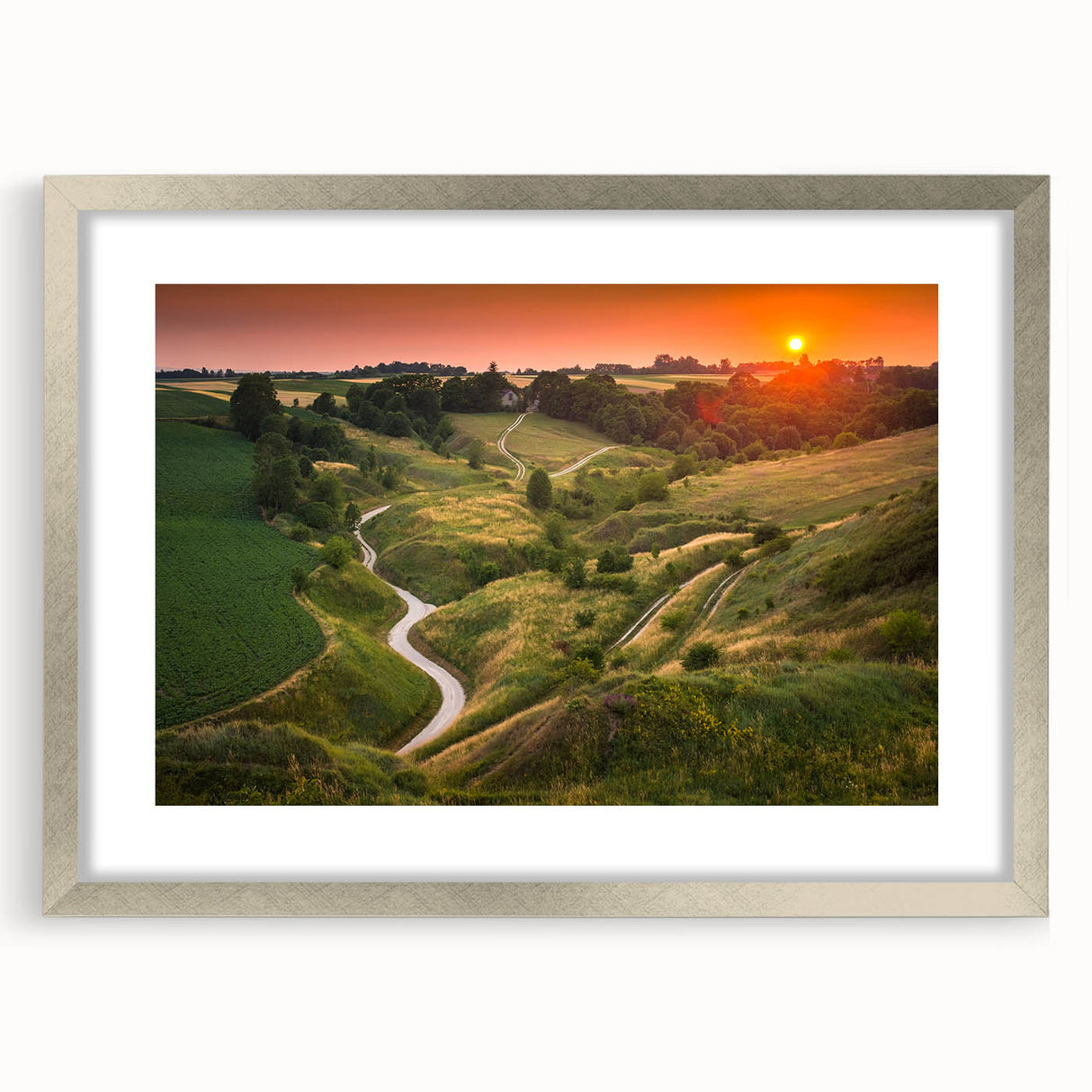 Extra large abstract art print of a textured European scenery in muted earth tones, framed in silver.