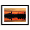 Abstract art print of colorful, textured scenery, in a black frame with mat, suitable for large living room walls.