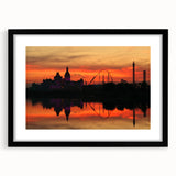 Abstract art print of colorful, textured scenery, in a black frame with mat, suitable for large living room walls.