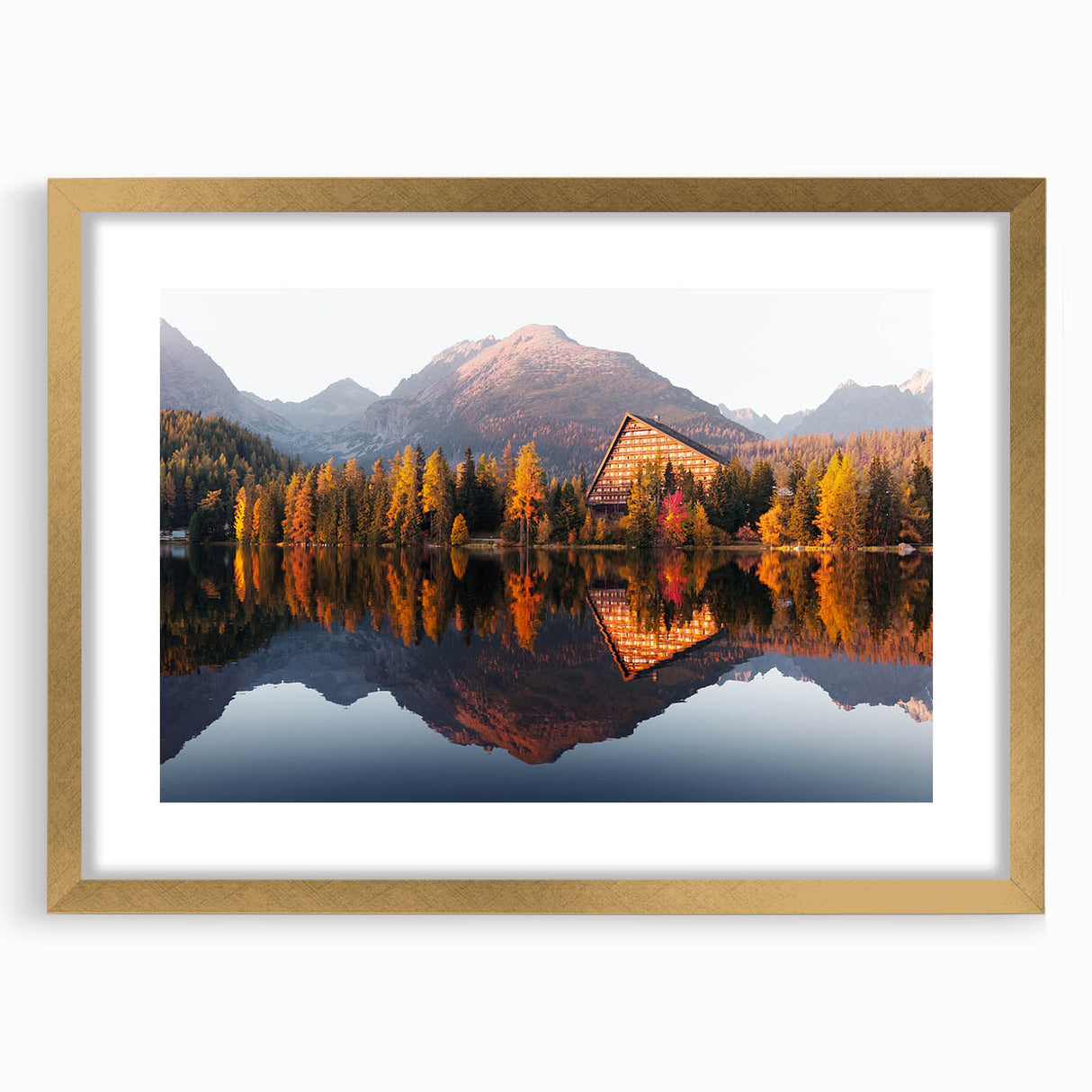Abstract art print of a European scenery in gold frame with mat, using muted earth tones, suitable for dining room decor.