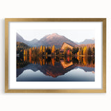 Abstract art print of a European scenery in gold frame with mat, using muted earth tones, suitable for dining room decor.