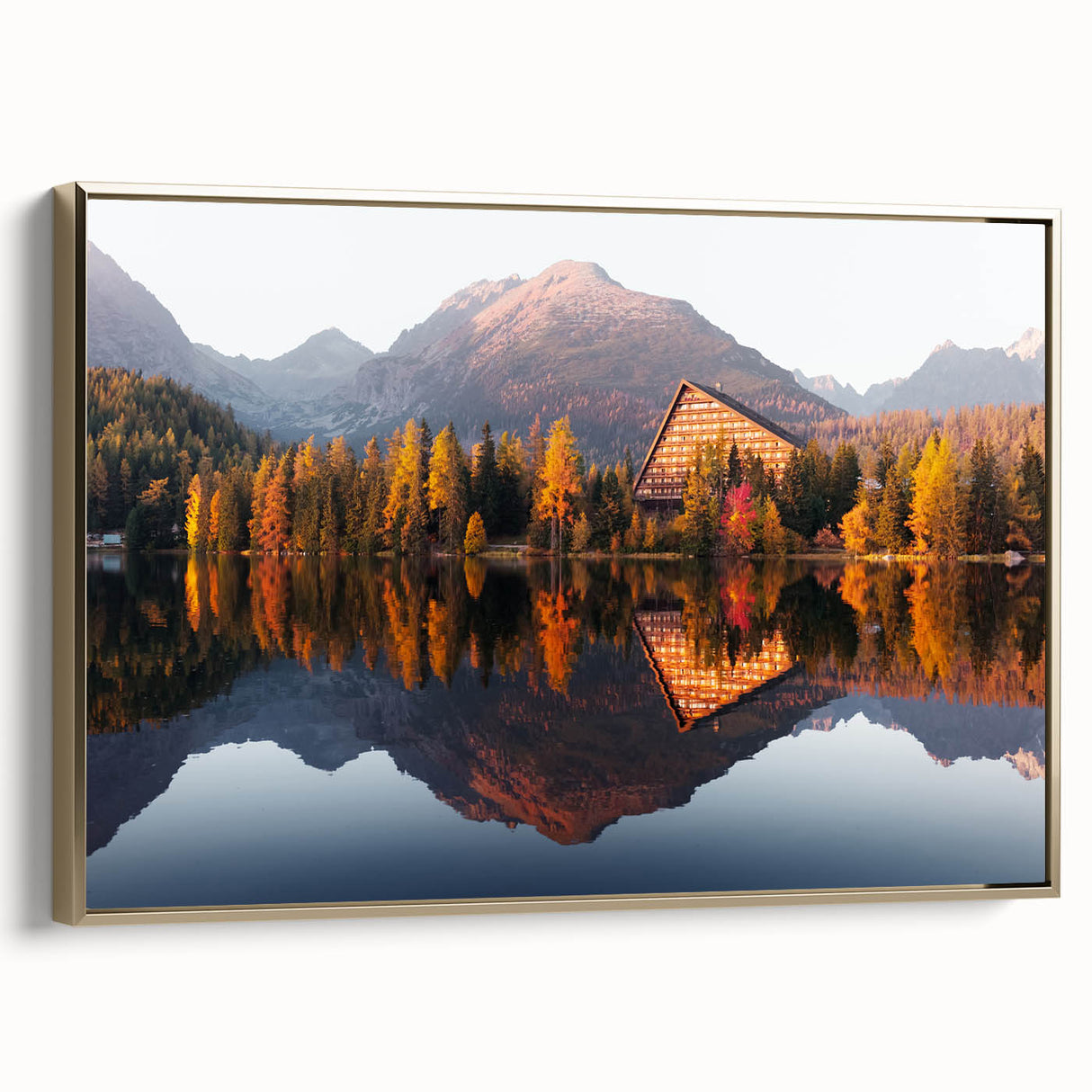 Framed canvas wall art featuring a vintage-style Slovakian landscape in muted gold and black tones.