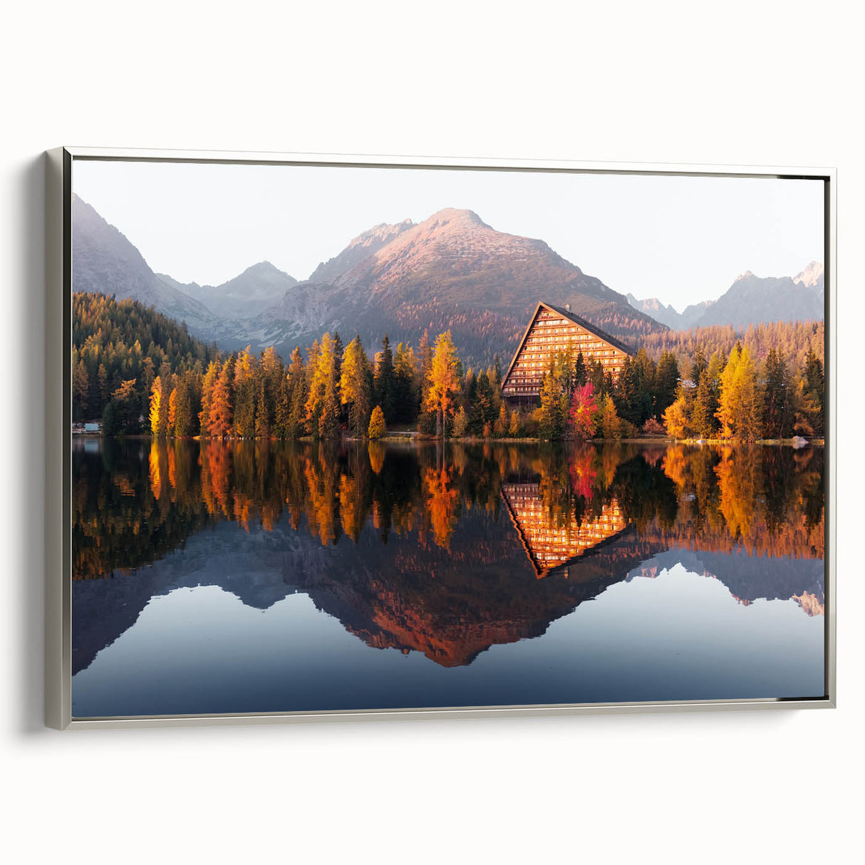 Framed canvas featuring a vintage-style landscape painting of a Slovakian scene, with vibrant colors on a black background.