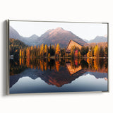 Framed canvas featuring a vintage-style landscape painting of a Slovakian scene, with vibrant colors on a black background.
