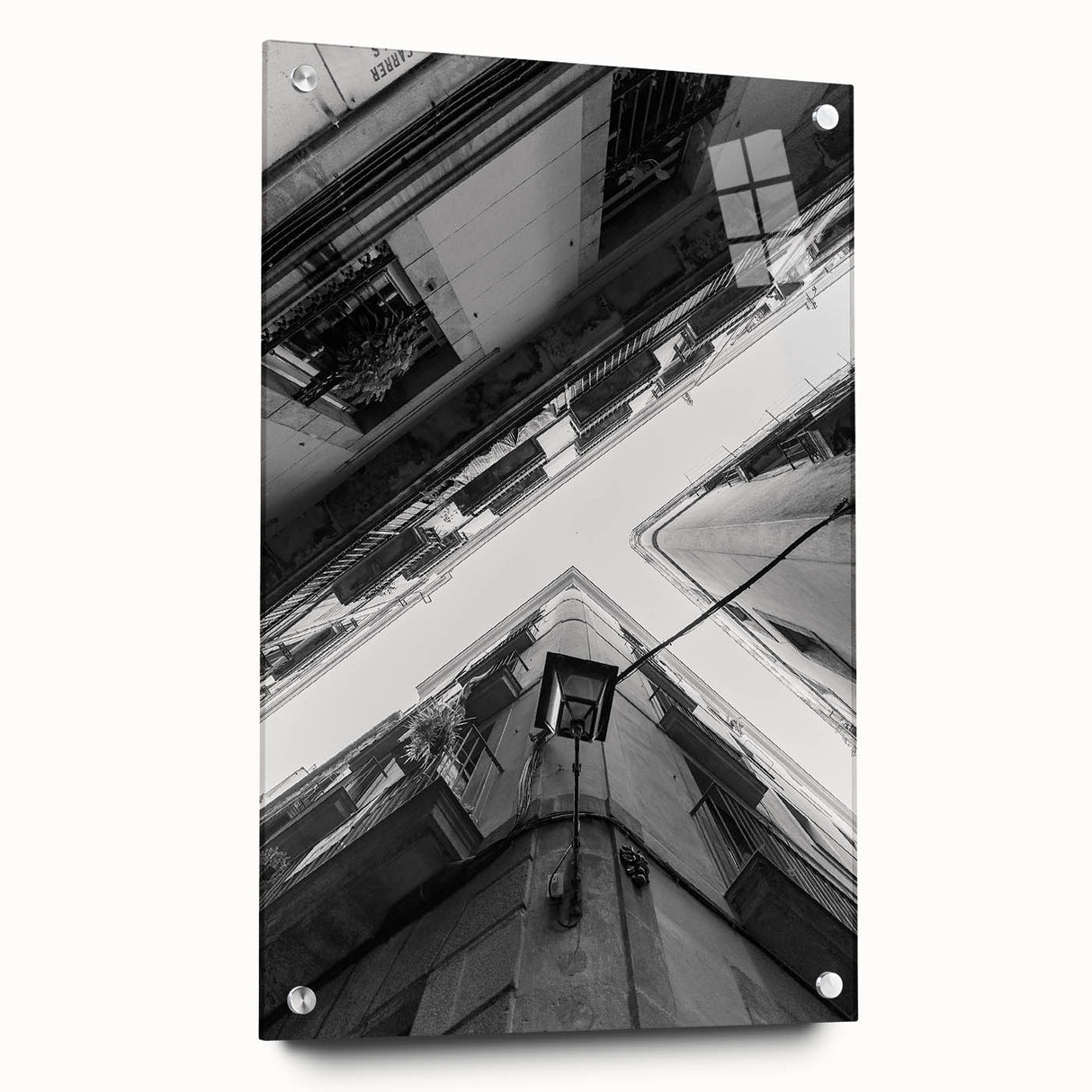 Acrylic print of a large abstract depiction of Barcelona, featuring vibrant hues of blue and orange.