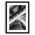 Colorful abstract art print of Barcelona scenery in vibrant hues on a large textured canvas, framed in black.