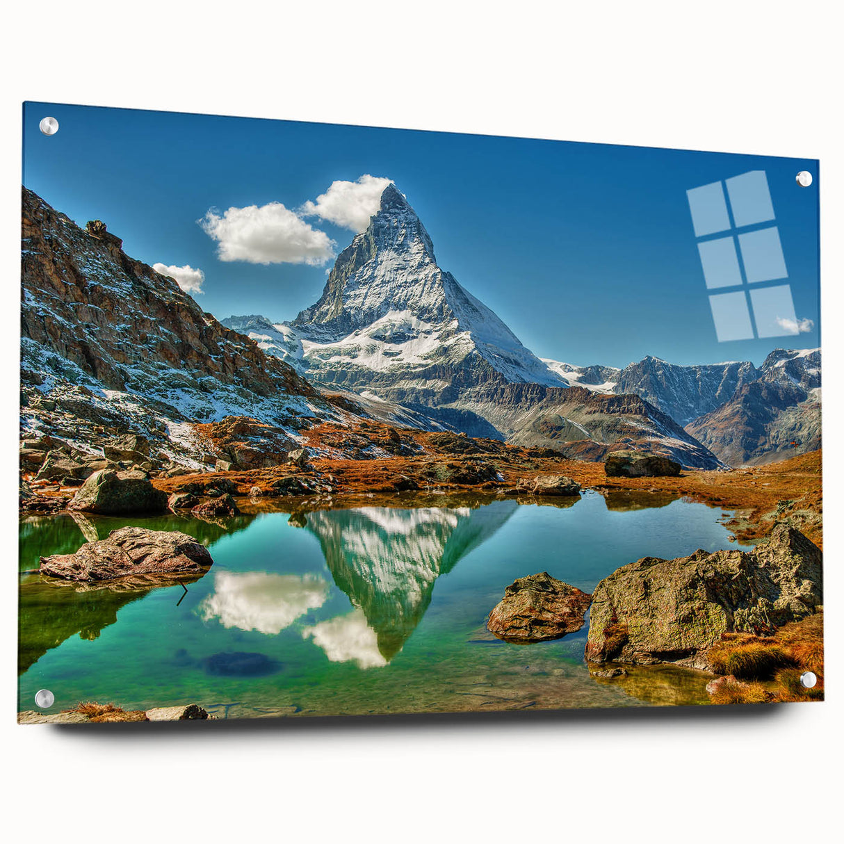 Acrylic print of a Swiss landscape with rolling hills and a serene lake, in muted green and blue tones.