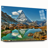 Acrylic print of a Swiss landscape with rolling hills and a serene lake, in muted green and blue tones.