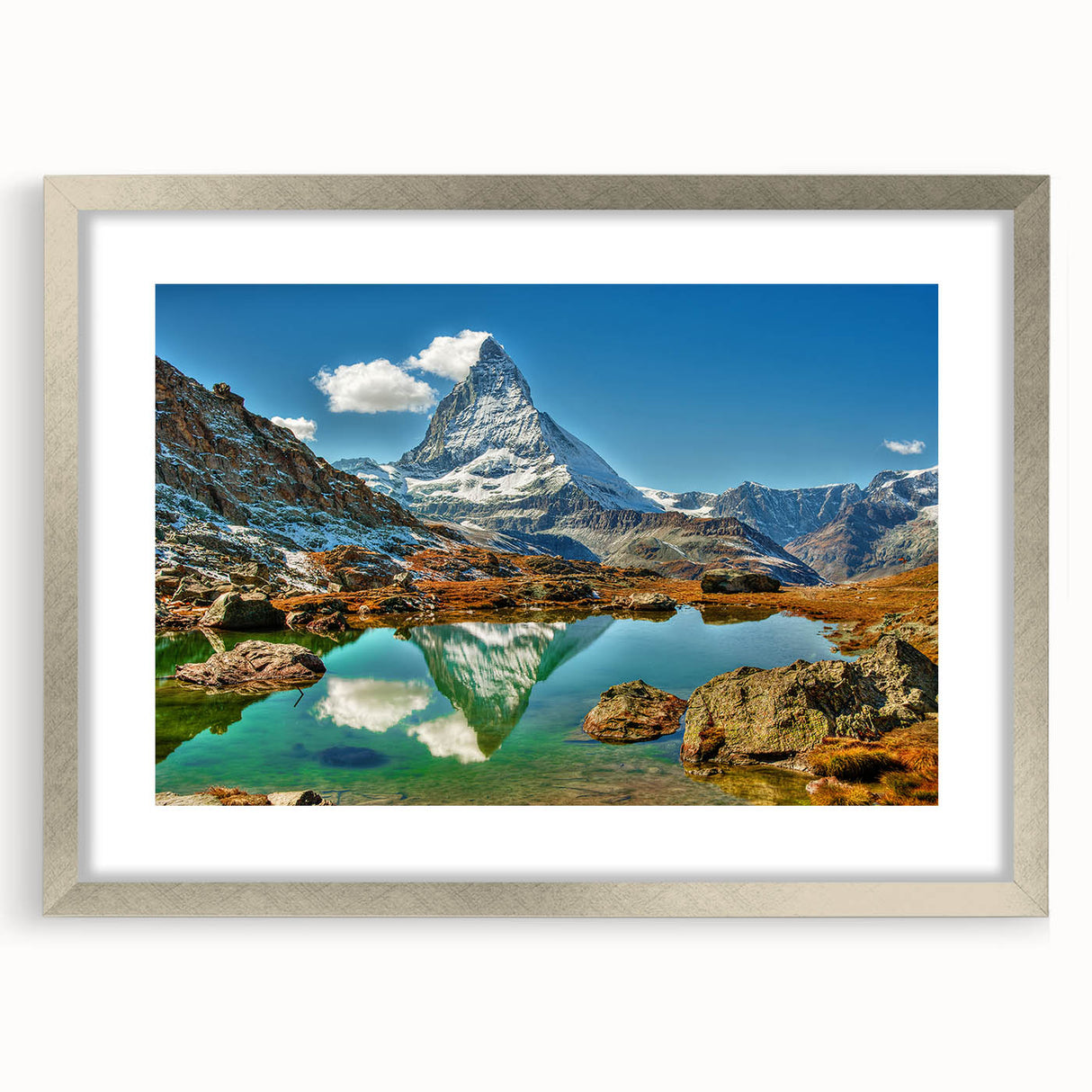Textured abstract art print of a European scenery in Switzerland, featuring muted earth tones on a framed silver mat.