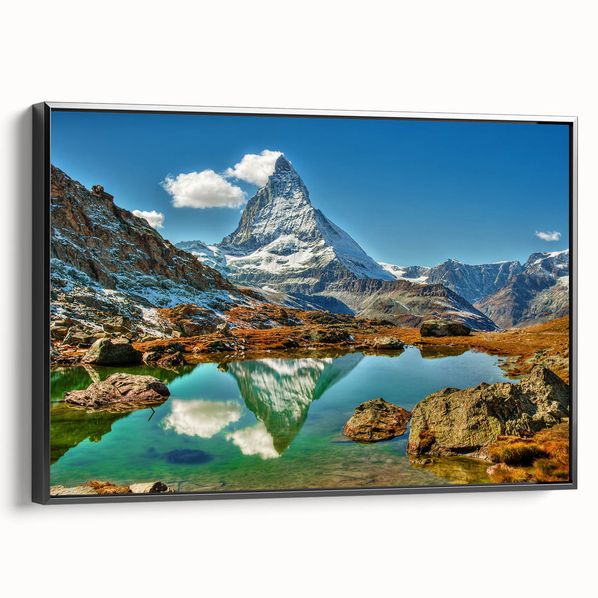 Black and white framed canvas of a vintage Swiss landscape, ideal for bedroom wall art.