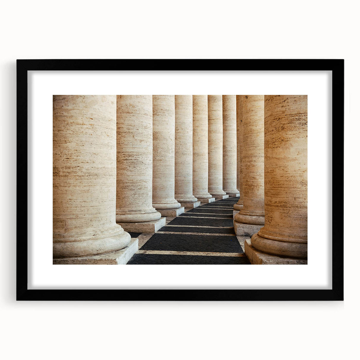 Colorful abstract art print of a European scene, featuring vibrant hues on a textured canvas, framed with a black mat.