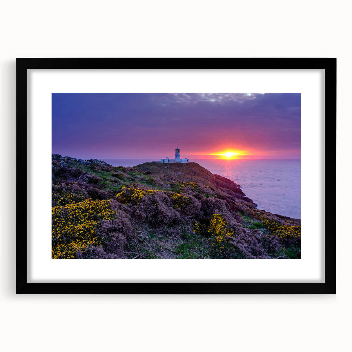 Extra large abstract art print of a colorful, textured Welsh landscape on framed black mat, ideal for living room decor.