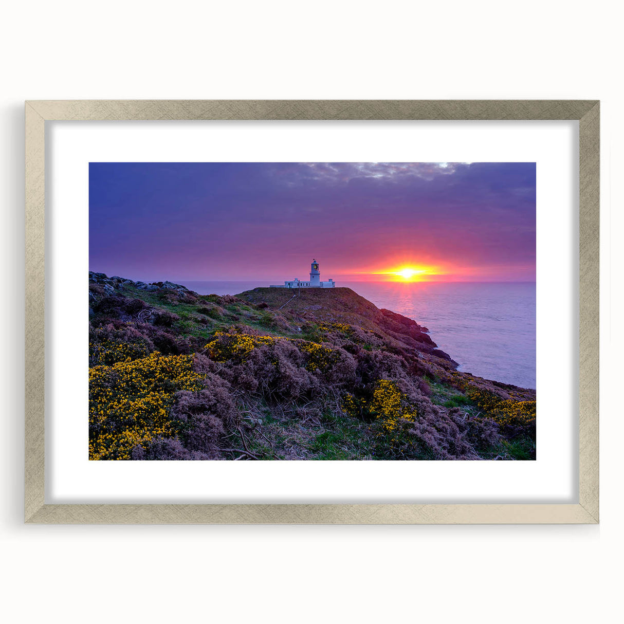 Textured art print of an abstract Welsh landscape in muted earth tones, framed in silver, ideal for bedroom decor.