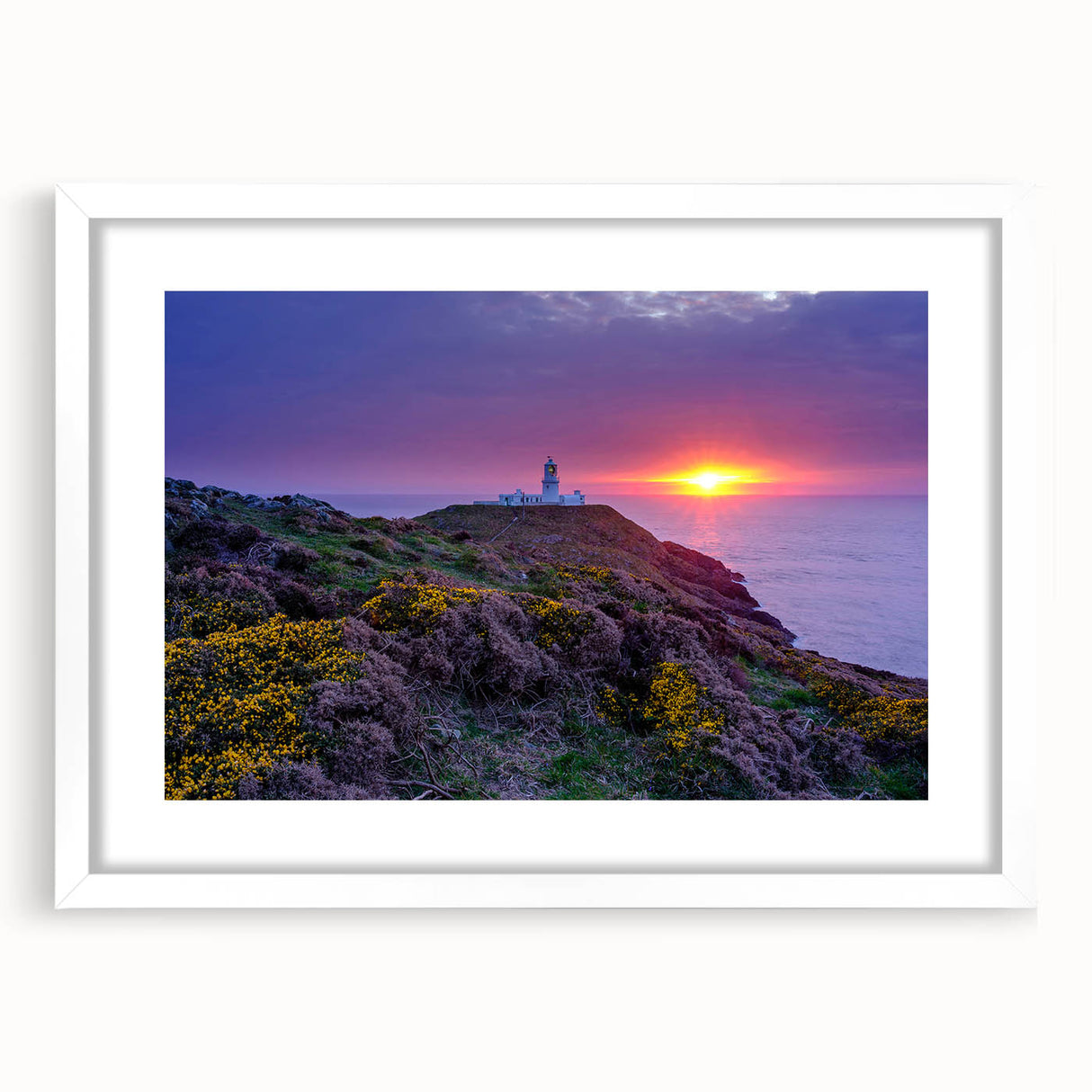 Abstract art print of a European Welsh landscape in muted earth tones, framed with a white mat.