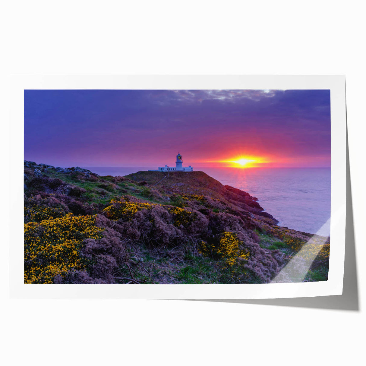 Rolled print of a Welsh landscape featuring vibrant green fields and a clear blue sky, ideal for art wall dining room.