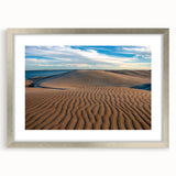 Textured abstract art print depicting Baja California scenery in muted earth tones, framed in silver.