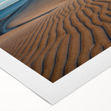 Art deco poster of Baja California scenery on rolled canvas, featuring muted earth tones, ideal for dining room wall art.