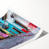 Extra large wall art featuring line art flowers in muted earth tones on a rolled canvas.