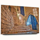Large abstract wall art of Tel Aviv skyline in muted blue and grey tones on acrylic glass.
