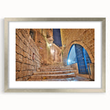 Textured abstract art print of Tel Aviv scenery in muted earth tones, framed in silver, ideal for bedroom art.