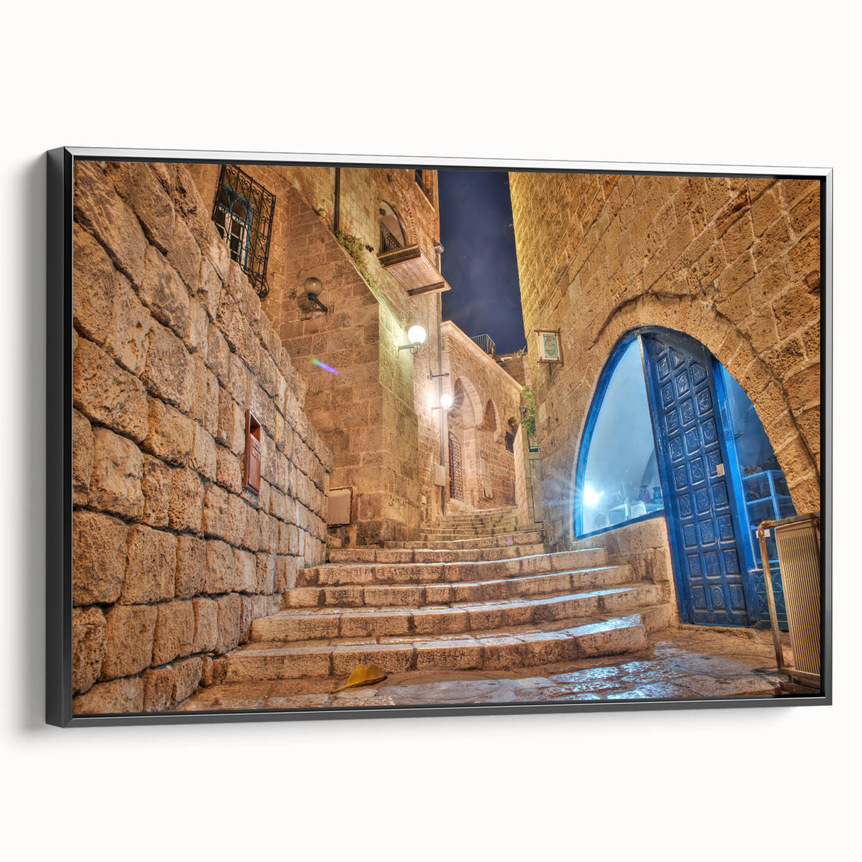 Black and white framed canvas of Tel Aviv landscape in a vintage poster style, suitable for bedroom decor.