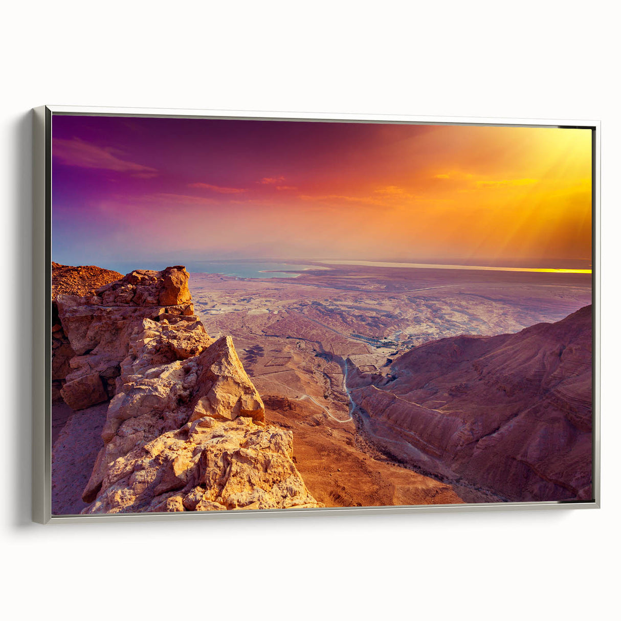 Framed canvas featuring a vintage-style landscape painting of a Middle Eastern scenery.