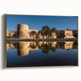 Framed canvas depicting a vintage-style landscape of Oman, in muted gold and black tones, ideal for bedroom wall decor.